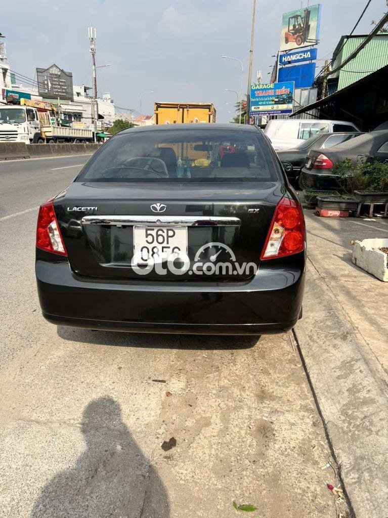 Daewoo Lacetti EX 2009 - Cần bán gấp Daewoo Lacetti EX sản xuất năm 2009, màu đen, nhập khẩu