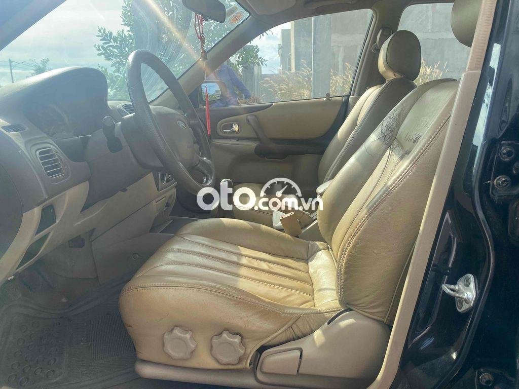Ford Laser 1.6MT 2003 - Xe Ford Laser 1.6MT sản xuất 2003, màu đen chính chủ