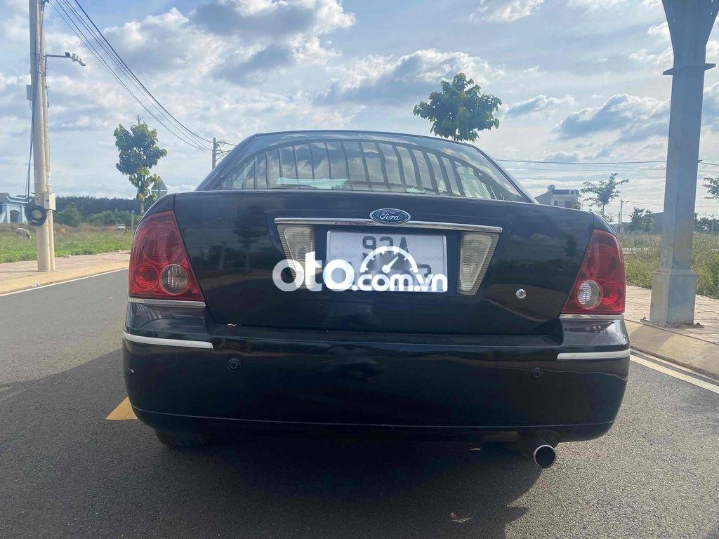 Ford Laser 1.6MT 2003 - Xe Ford Laser 1.6MT sản xuất 2003, màu đen chính chủ