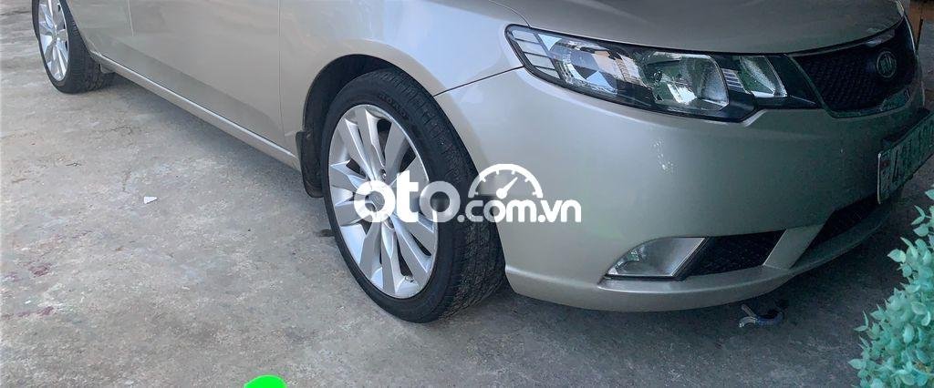 Kia Forte  1.6 AT   2010 - Bán Kia Forte 1.6 AT sản xuất năm 2010, màu bạc giá cạnh tranh