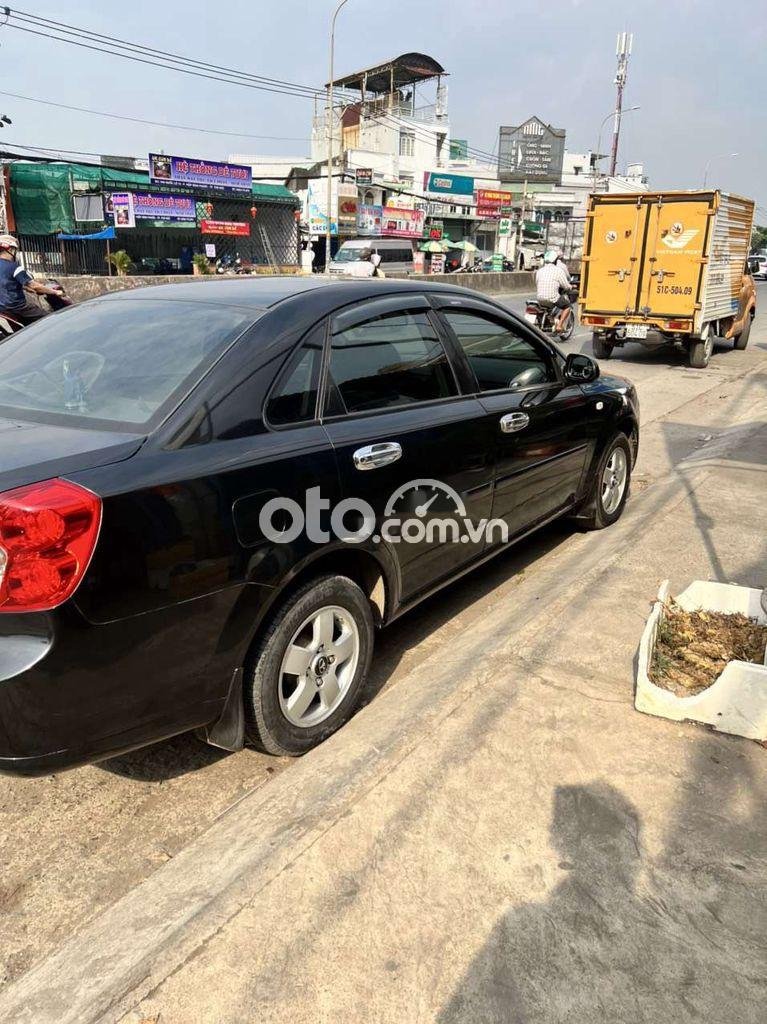 Daewoo Lacetti EX 2009 - Cần bán gấp Daewoo Lacetti EX sản xuất năm 2009, màu đen, nhập khẩu