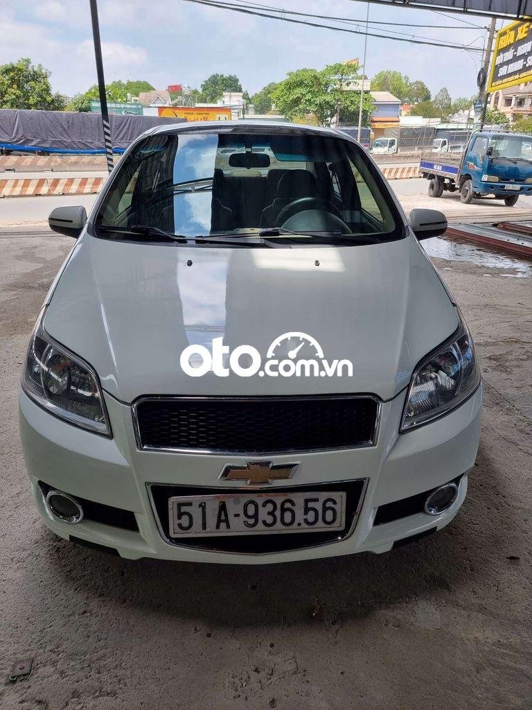 Chevrolet Aveo LTZ 2014 - Cần bán lại xe Chevrolet Aveo LTZ sản xuất năm 2014, màu trắng số tự động, giá 245tr