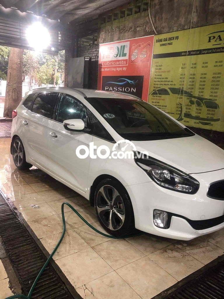 Kia Rondo 2015 - Xe Kia Rondo 1.7 năm 2015, màu trắng, nhập khẩu nguyên chiếc số sàn