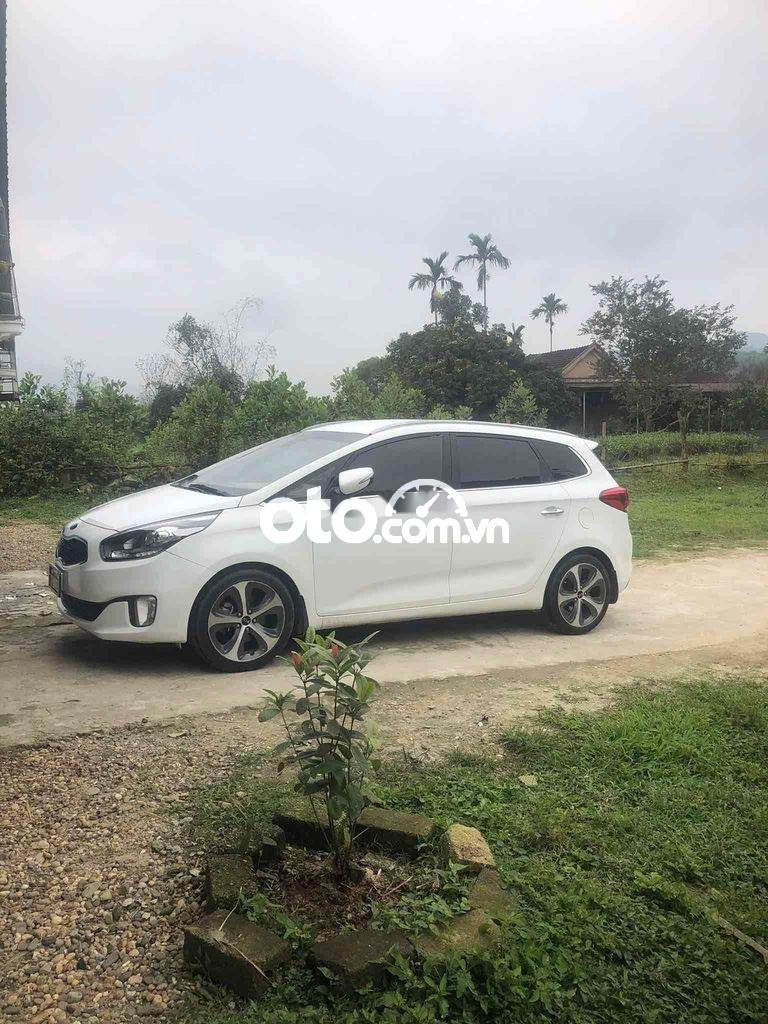 Kia Rondo 2015 - Xe Kia Rondo 1.7 năm 2015, màu trắng, nhập khẩu nguyên chiếc số sàn