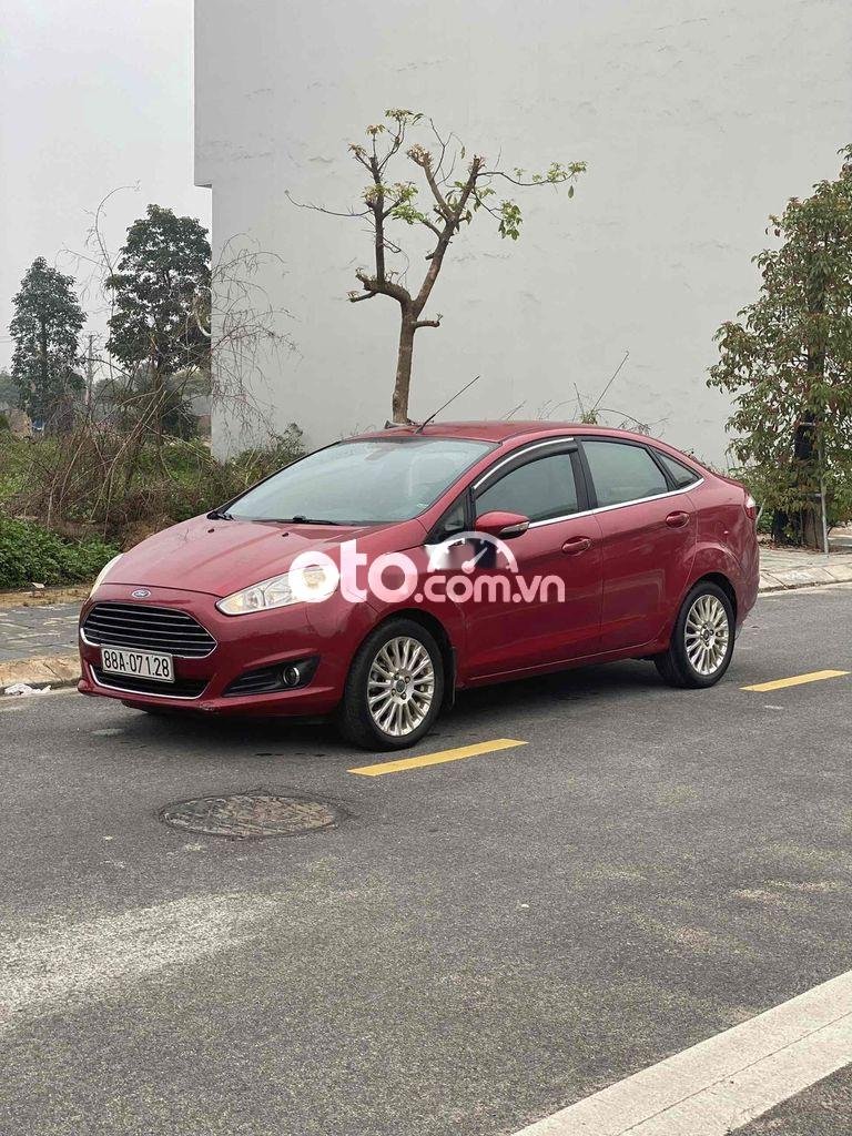 Ford Fiesta 2014 - Bán Ford Fiesta 1.6AT sản xuất năm 2014, màu đỏ chính chủ, 332tr