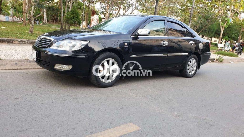 Toyota Camry 2004 - Bán ô tô Toyota Camry 2.4G sản xuất 2004, màu đen