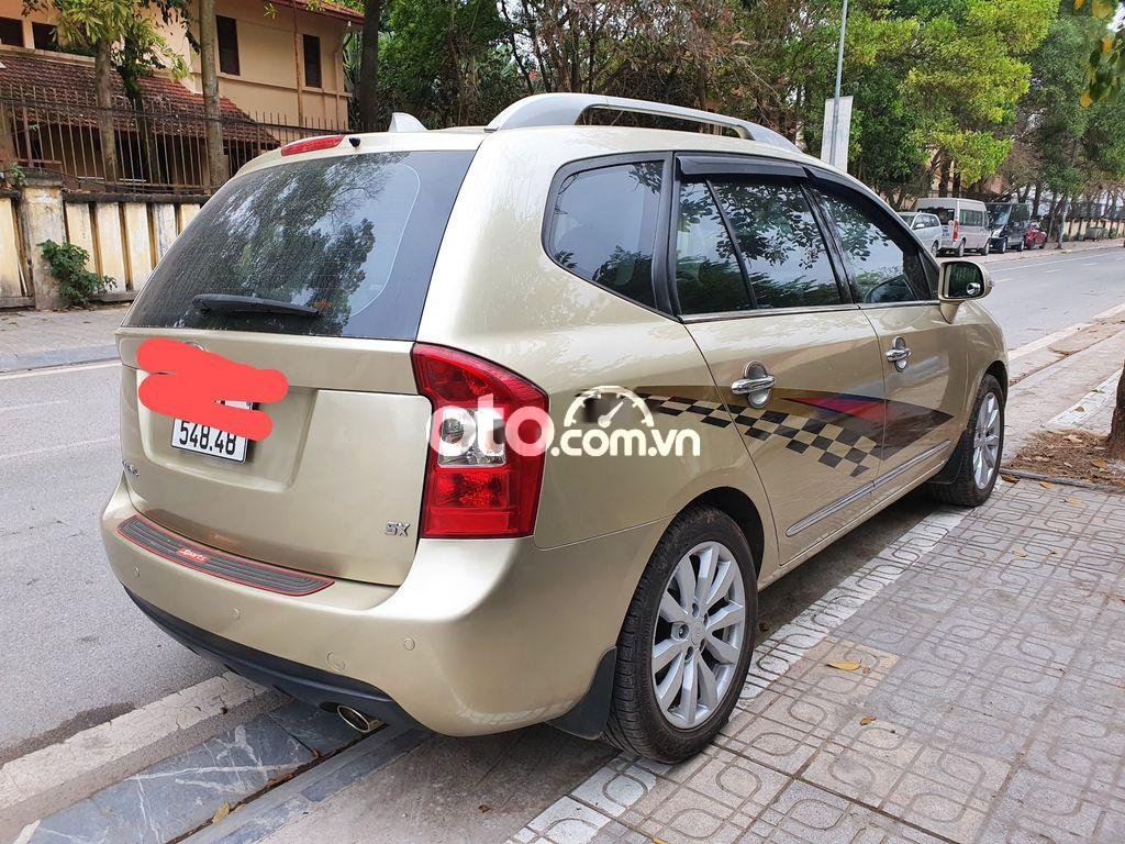 Kia Carens 2012 - Bán ô tô Kia Carens sản xuất 2012, màu vàng