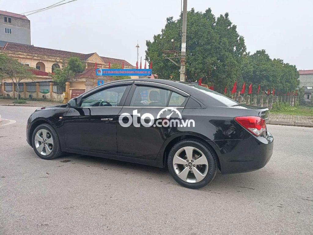 Daewoo Lacetti 2010 - Bán Daewoo Lacetti CDX AT sản xuất năm 2010, màu đen, nhập khẩu nguyên chiếc