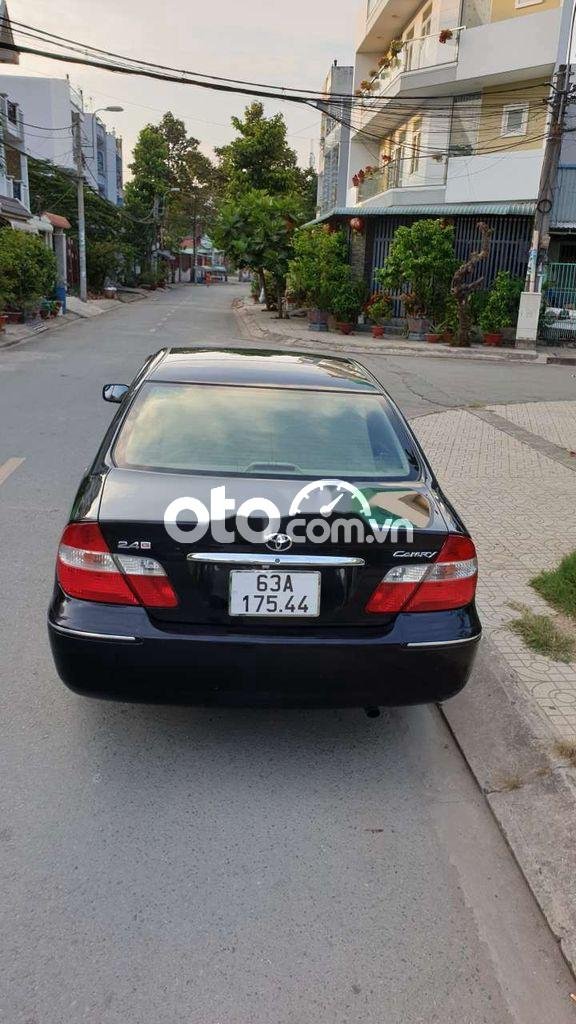 Toyota Camry 2004 - Bán ô tô Toyota Camry 2.4G sản xuất 2004, màu đen