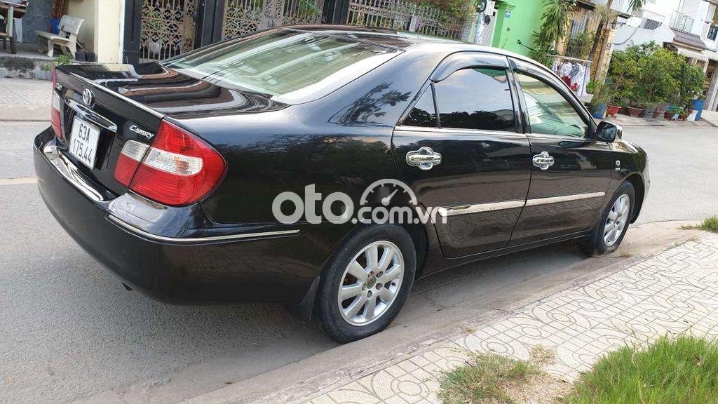 Toyota Camry 2004 - Bán ô tô Toyota Camry 2.4G sản xuất 2004, màu đen