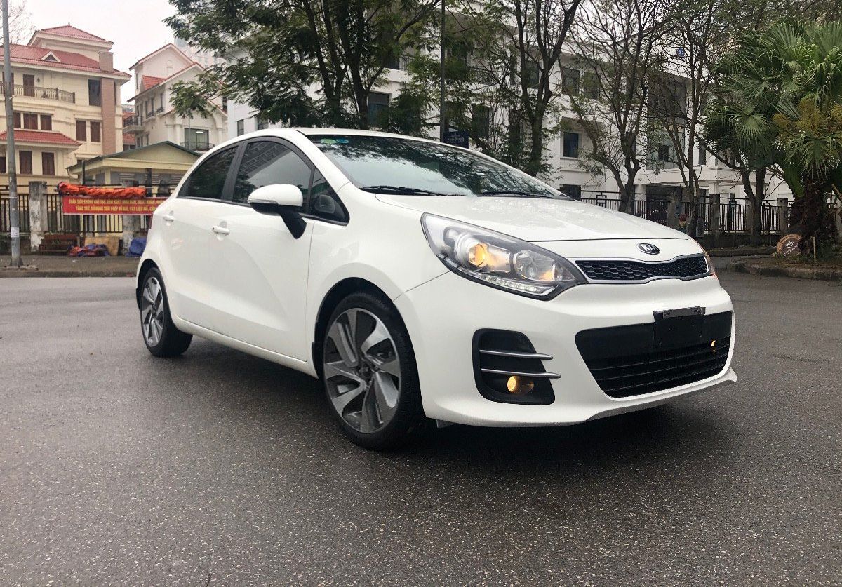 Kia Rio 2015 - Cần bán lại xe Kia Rio 1.4 GAT 2015, màu trắng, xe nhập 