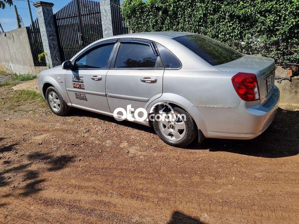 Chevrolet Lacetti 2012 - Cần bán gấp Chevrolet Lacetti EX 1.6MT năm 2012, màu bạc số sàn giá cạnh tranh