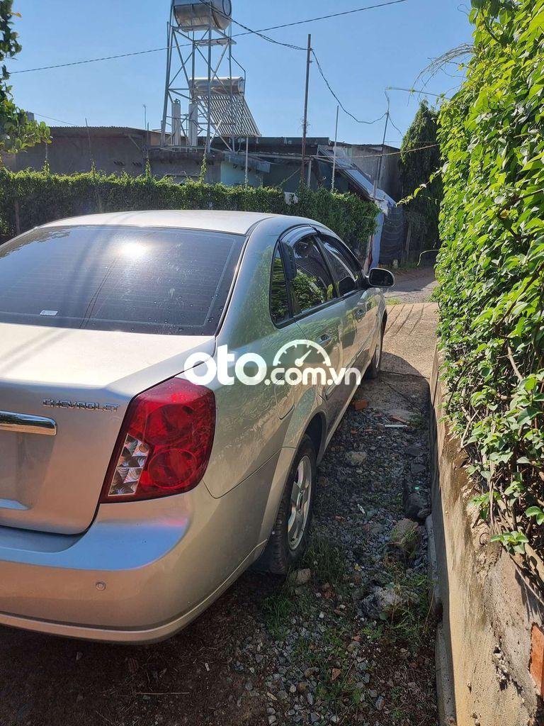 Chevrolet Lacetti 2012 - Cần bán gấp Chevrolet Lacetti EX 1.6MT năm 2012, màu bạc số sàn giá cạnh tranh