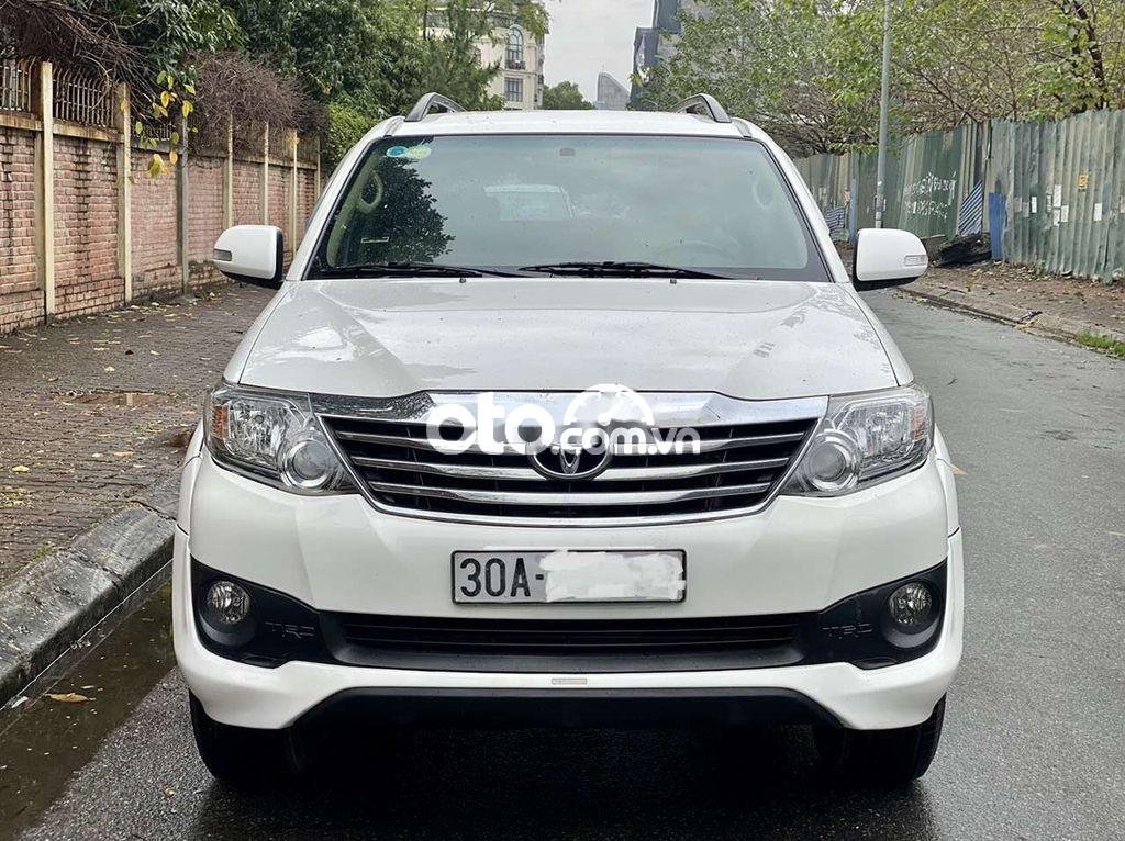 Toyota Fortuner 2014 - Bán xe Toyota Fortuner 2.7V TRD 4x2 sản xuất năm 2014, màu trắng như mới, giá 590tr