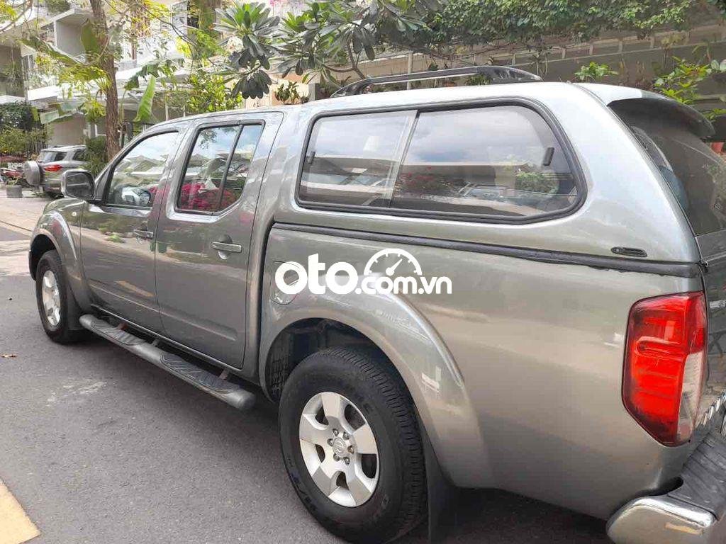 Nissan Navara 2011 - Bán Nissan Navara LE MT sản xuất 2011, màu xám, 300 triệu