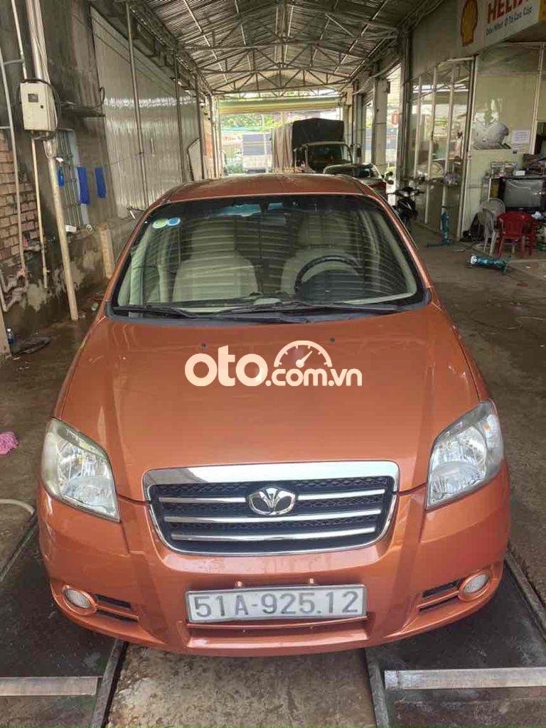 Daewoo Gentra 2009 - Cần bán lại xe Daewoo Gentra SX năm sản xuất 2009, màu cam đẹp