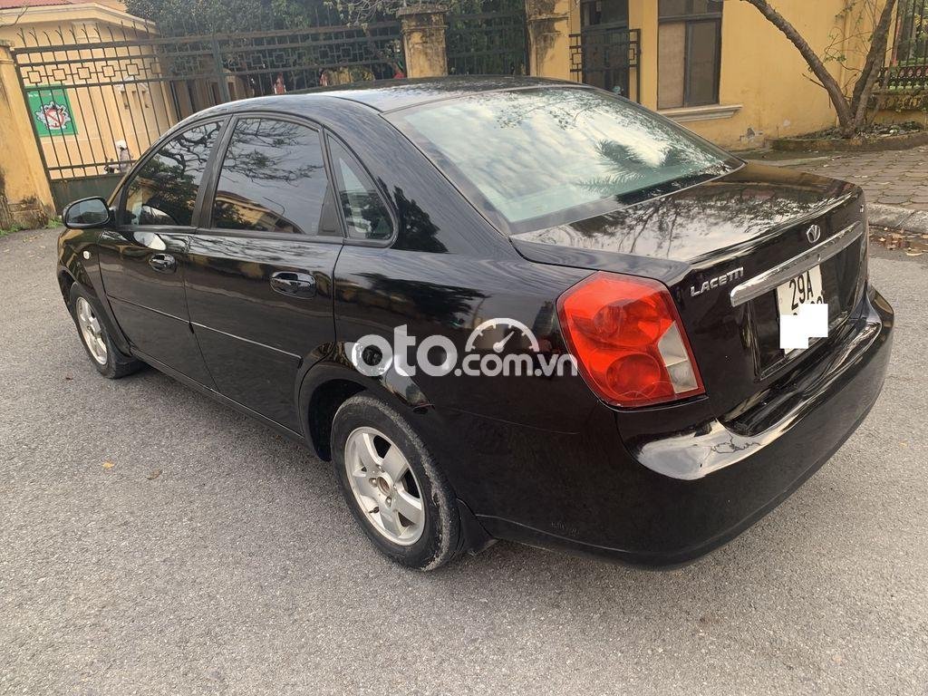 Daewoo Lacetti 2011 - Bán Daewoo Lacetti EX năm sản xuất 2011, màu đen số sàn