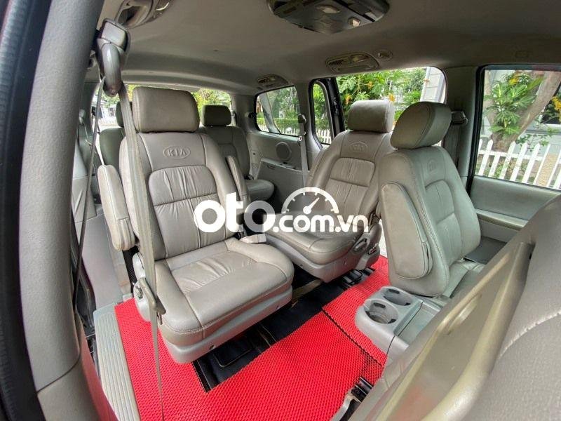 Kia Carnival 2009 - Bán Kia Carnival 2.5AT năm 2009, màu đen số tự động