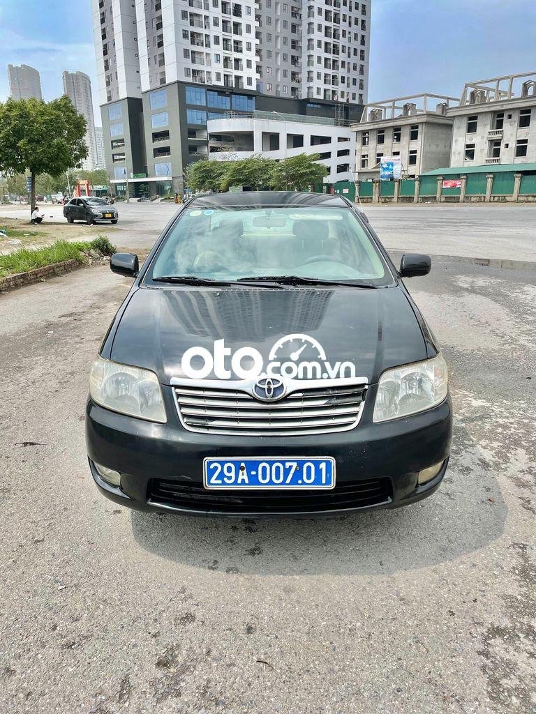 Toyota Corolla 2006 - Bán xe Toyota Corolla năm sản xuất 2006, màu đen, nhập khẩu, giá tốt