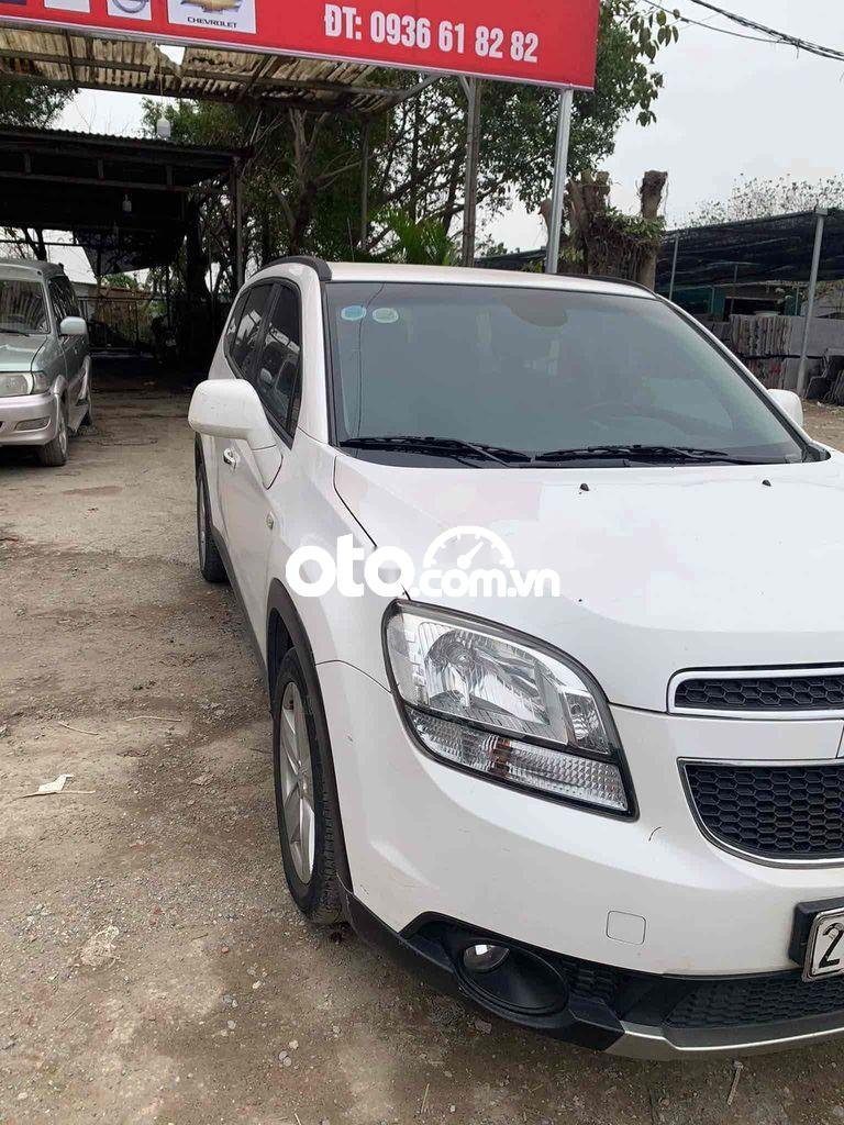 Chevrolet Orlando 2013 - Cần bán gấp Chevrolet Orlando LTZ sản xuất 2013, màu trắng số tự động