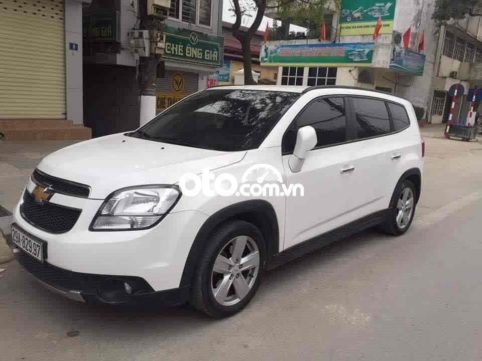 Chevrolet Orlando 2013 - Cần bán gấp Chevrolet Orlando LTZ sản xuất 2013, màu trắng số tự động