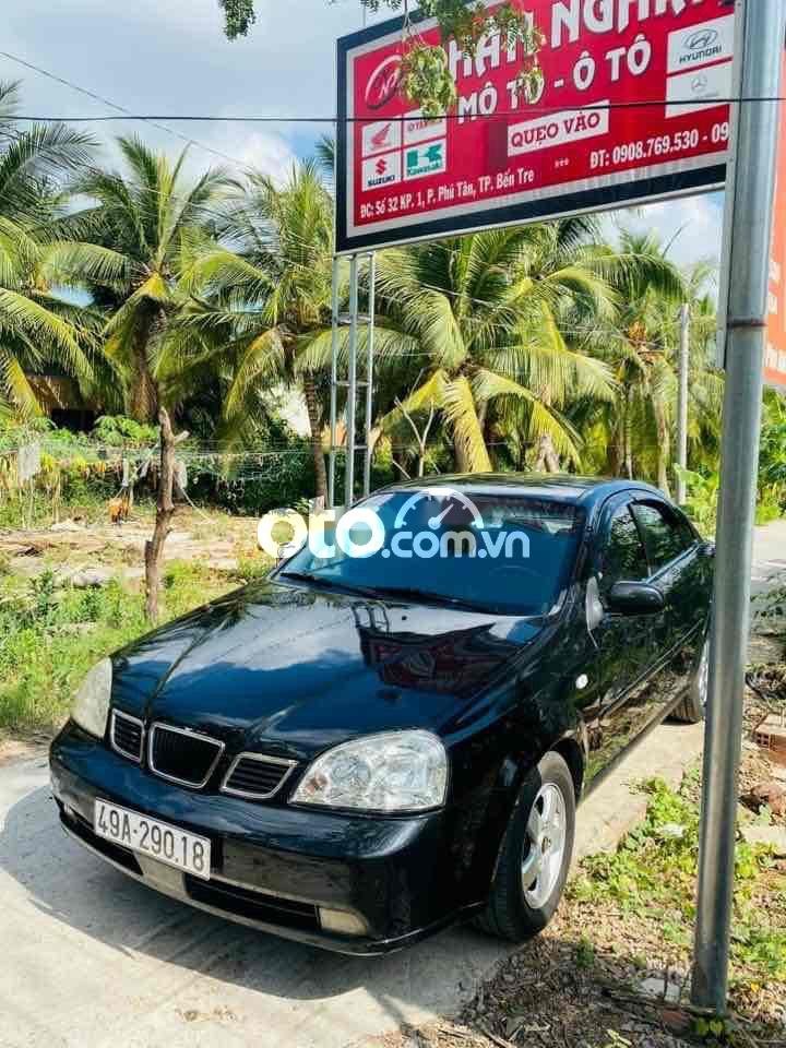 Daewoo Lacetti 2004 - Cần bán lại xe Daewoo Lacetti năm sản xuất 2004, màu đen, nhập khẩu nguyên chiếc, giá tốt