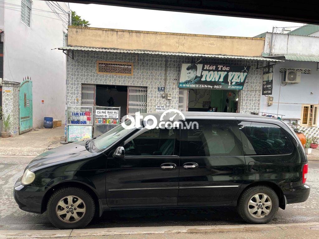 Kia Carnival 2006 - Bán Kia Carnival 2.7MT sản xuất 2006, màu đen