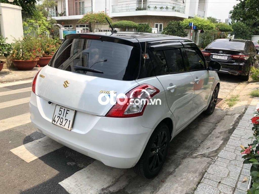 Suzuki Swift 2017 - Bán Suzuki Swift RS 1.4AT sản xuất năm 2017, màu trắng, xe nhập