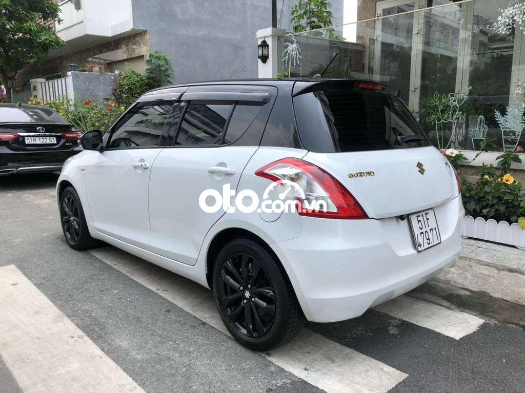 Suzuki Swift 2017 - Bán Suzuki Swift RS 1.4AT sản xuất năm 2017, màu trắng, xe nhập