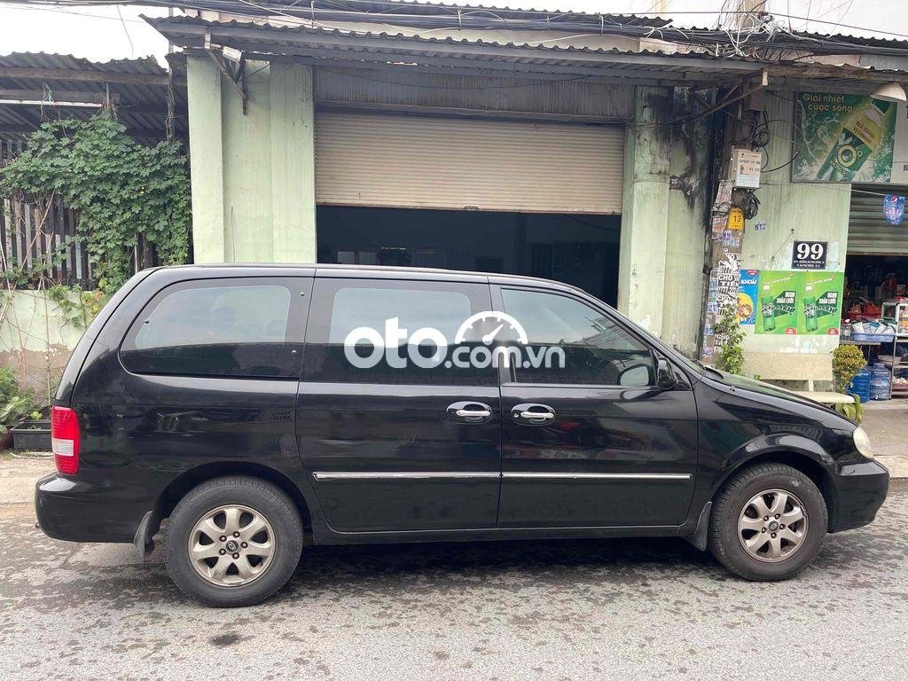 Kia Carnival 2006 - Bán Kia Carnival 2.7MT sản xuất 2006, màu đen