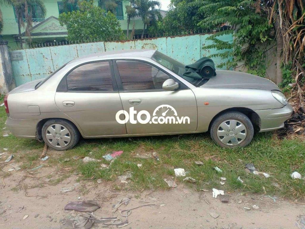 Daewoo Nubira 2003 - Bán ô tô Daewoo Nubira 2.0 sản xuất 2003, màu bạc còn mới, 39tr