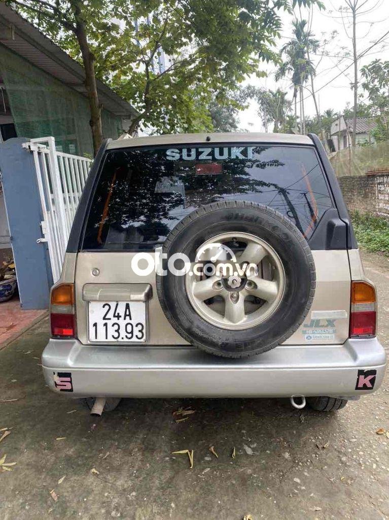 Suzuki Vitara 2004 - Cần bán xe Suzuki Vitara JLX năm sản xuất 2004, màu vàng cát