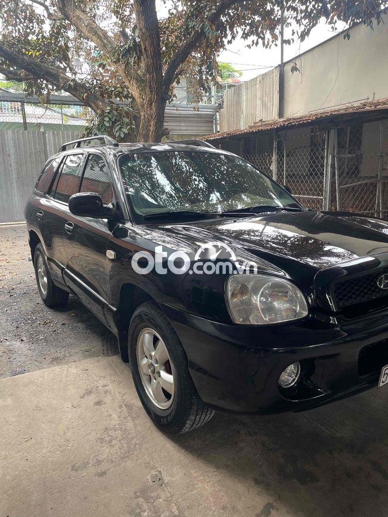 Hyundai Santa Fe 2004 - Cần bán gấp Hyundai Santa Fe năm 2004, màu đen, xe nhập còn mới