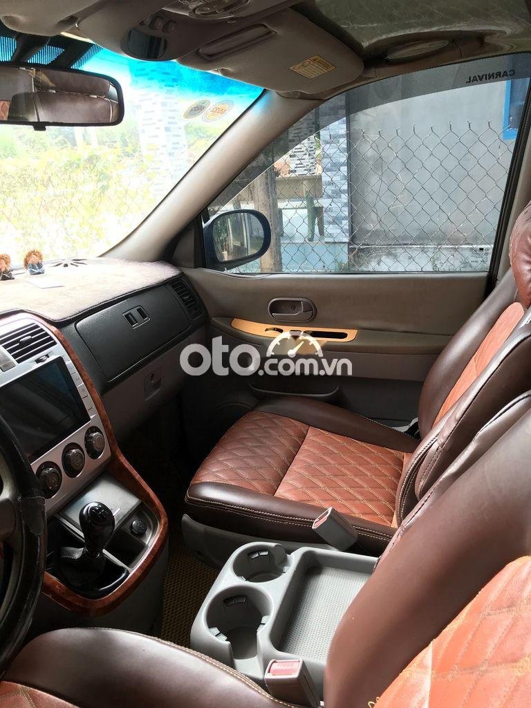 Kia Carnival 2006 - Bán ô tô Kia Carnival sản xuất năm 2006, màu đen