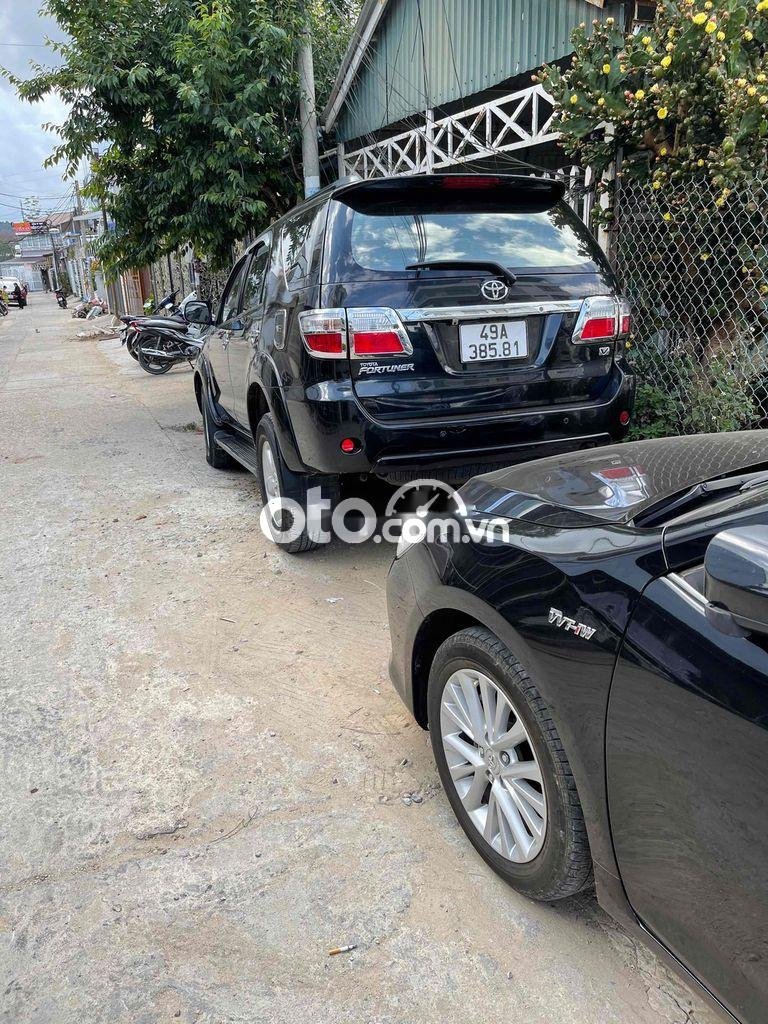 Toyota Fortuner 2009 - Bán xe Toyota Fortuner 2.7V 4x4 AT năm sản xuất 2009, màu đen số tự động