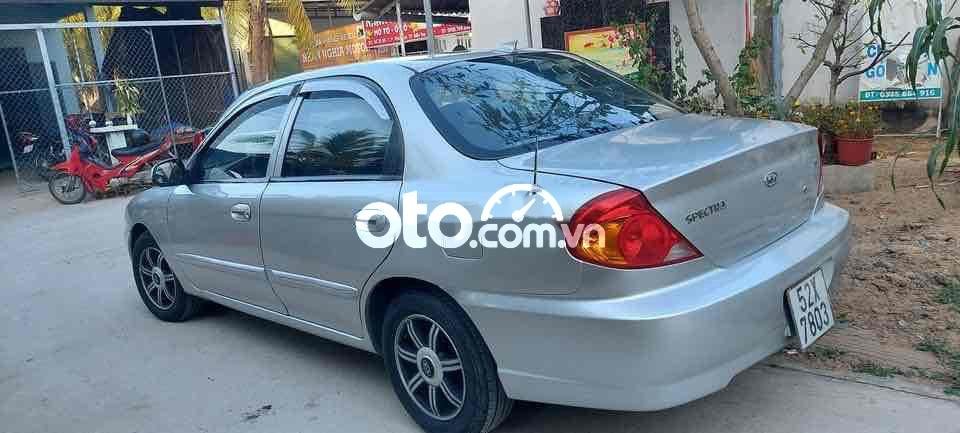 Kia Spectra 2004 - Cần bán xe Kia Spectra sản xuất năm 2004, màu bạc, nhập khẩu nguyên chiếc, 115 triệu