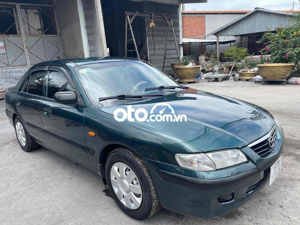 Mazda 626 2003 - Cần bán Mazda 626 MT sản xuất 2003, màu xanh lục giá cạnh tranh