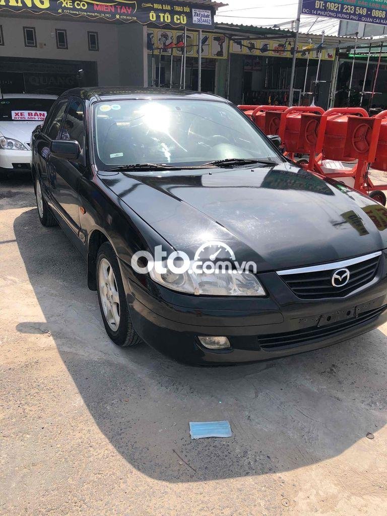 Mazda 626 2003 - Cần bán lại xe Mazda 626 sản xuất năm 2003, màu đen, 159tr