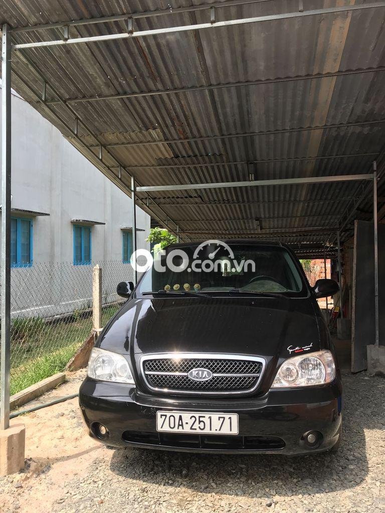 Kia Carnival 2006 - Bán ô tô Kia Carnival sản xuất năm 2006, màu đen