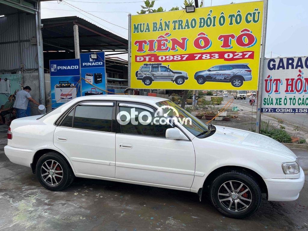 Toyota Corolla 1997 - Cần bán gấp Toyota Corolla sản xuất 1997, màu trắng, xe nhập giá cạnh tranh