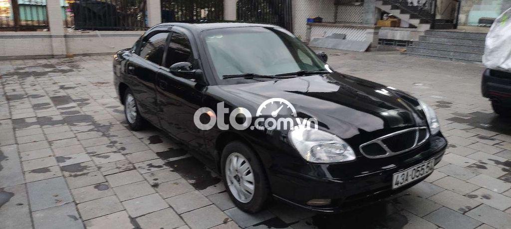 Daewoo Nubira 2002 - Cần bán Daewoo Nubira 2.0 năm 2002, màu đen 