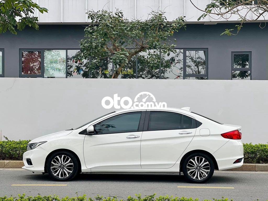 Honda City 2017 - Cần bán xe Honda City 1.5 TOP sản xuất năm 2017, màu trắng chính chủ