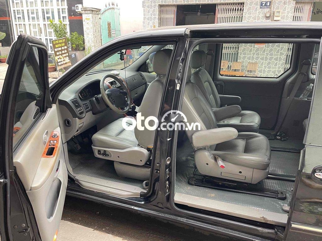 Kia Carnival 2006 - Bán Kia Carnival 2.7MT sản xuất 2006, màu đen