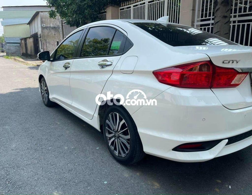 Honda City 2017 - Cần bán xe Honda City 1.5 TOP sản xuất năm 2017, màu trắng chính chủ