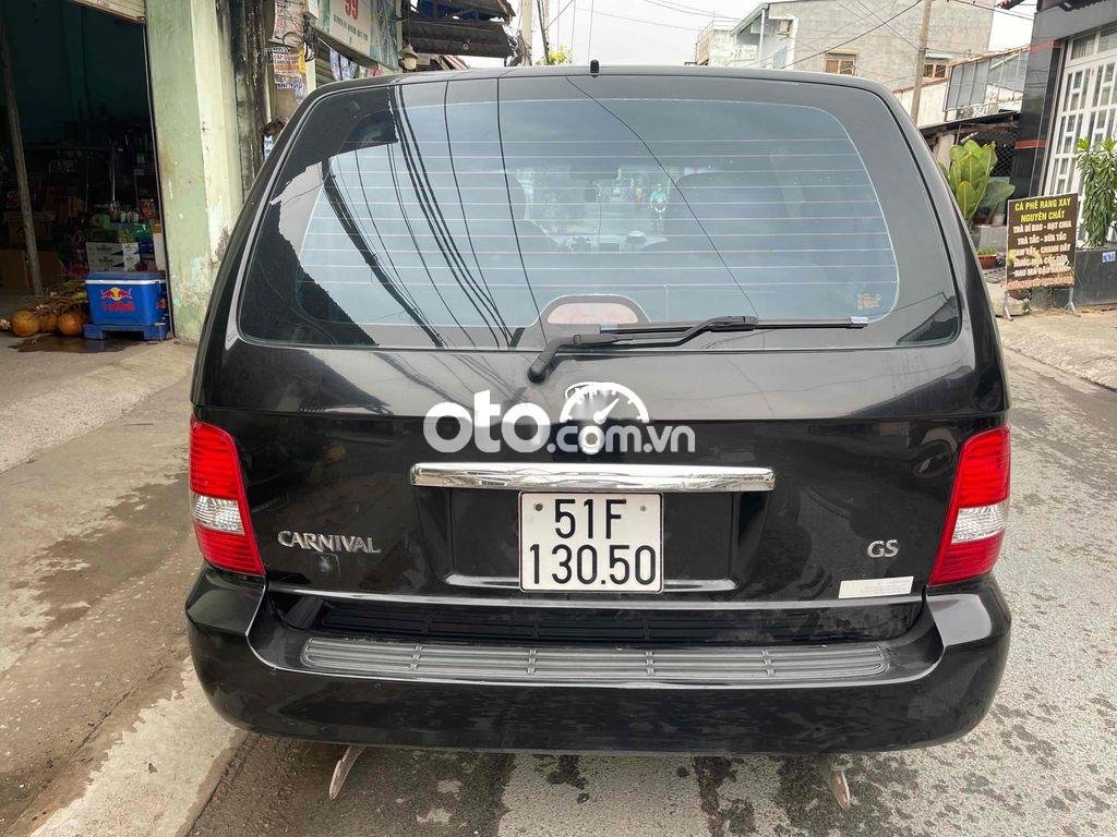 Kia Carnival 2006 - Bán Kia Carnival 2.7MT sản xuất 2006, màu đen