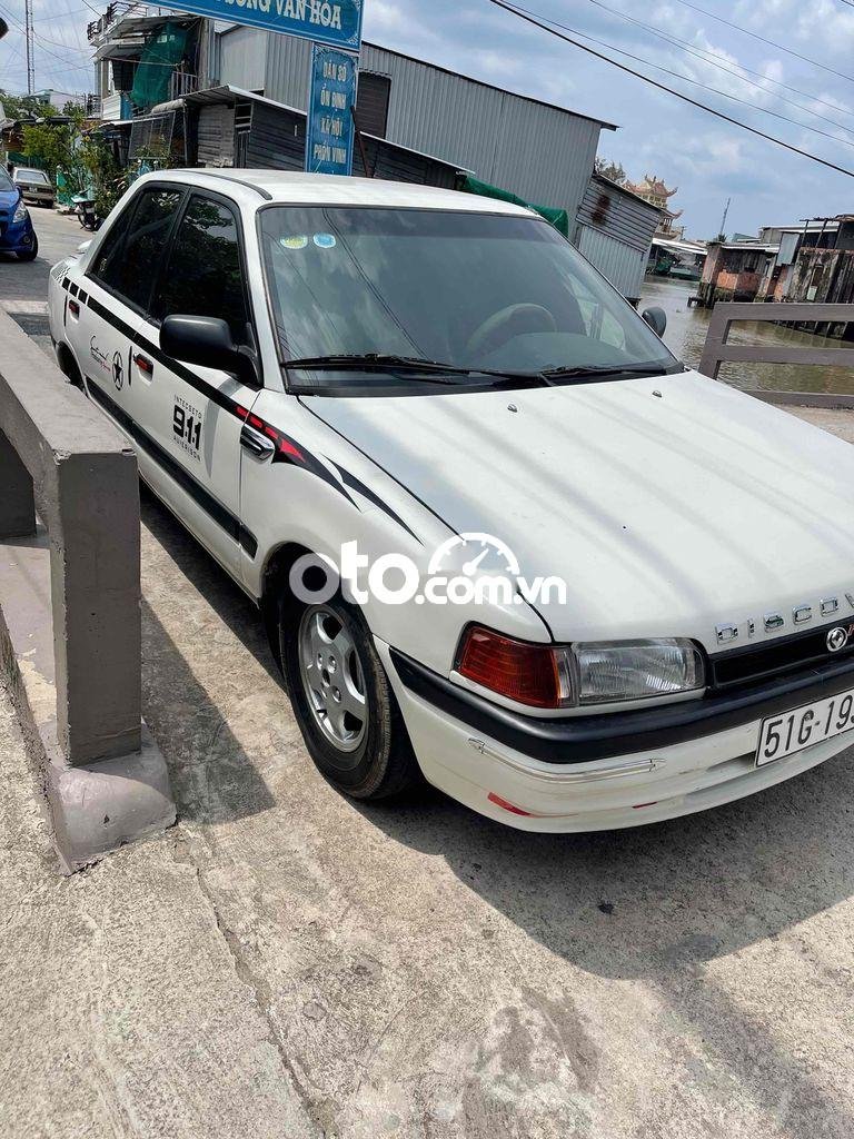 Mazda 323 1995 - Xe Mazda 323 năm 1995, màu trắng, nhập khẩu