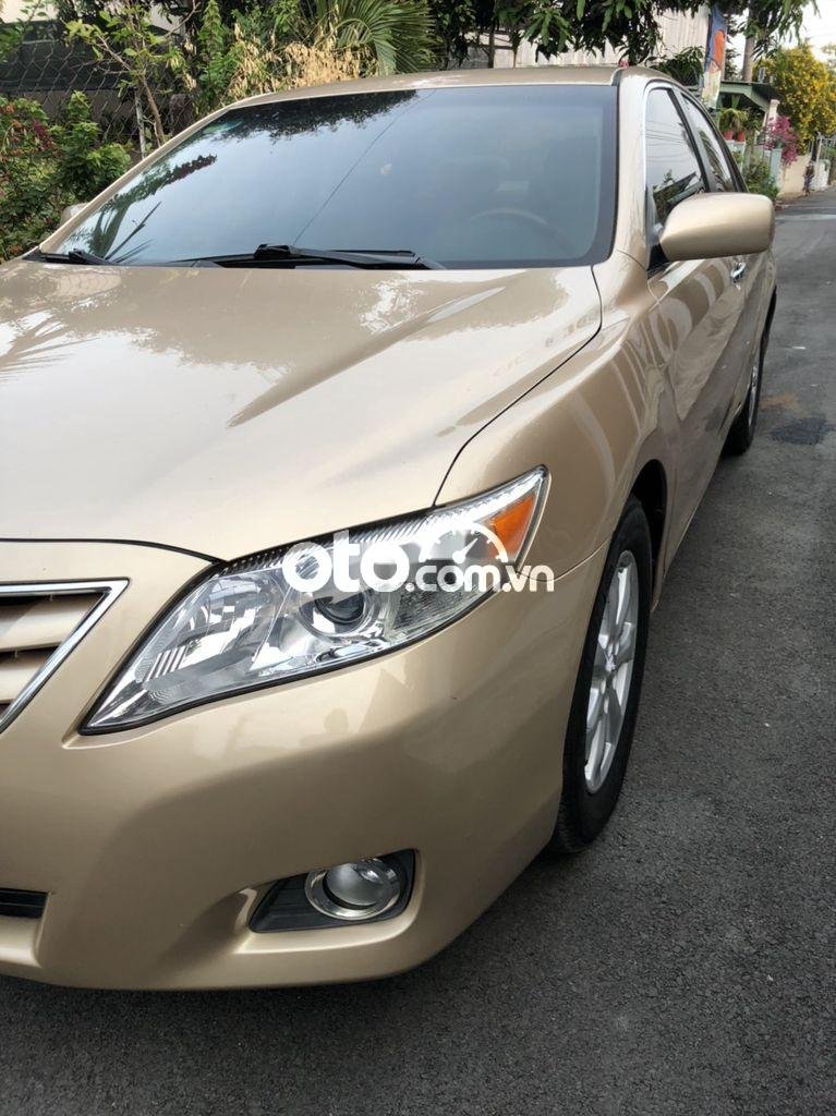 Toyota Camry 2008 - Bán xe Toyota Camry LE sản xuất năm 2008, màu vàng, xe nhập