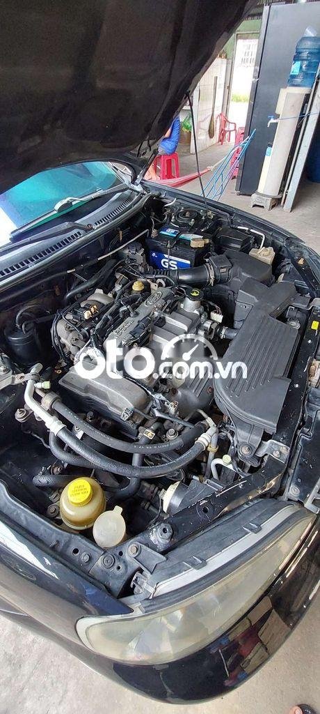 Ford Laser 2003 - Cần bán Ford Laser 1.8 năm 2003, màu đen, 129tr