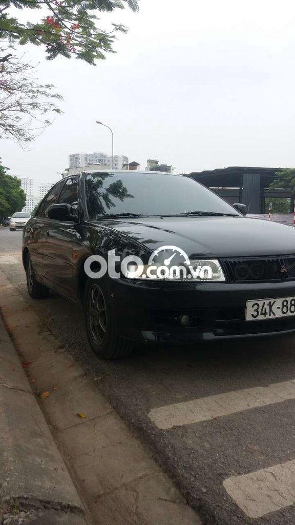 Mitsubishi Lancer 2002 - Bán Mitsubishi Lancer sản xuất năm 2002, màu đen, xe nhập, giá 85tr