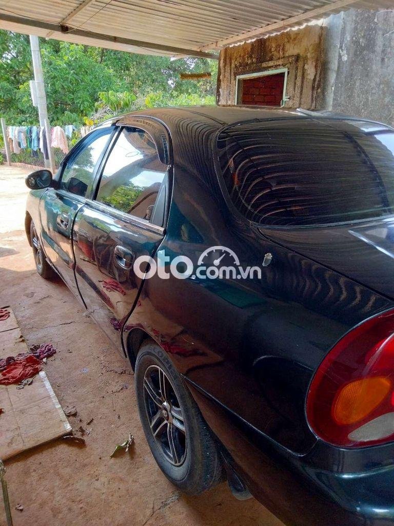 Daewoo Lanos 2002 - Bán ô tô Daewoo Lanos sản xuất năm 2002, màu xanh lam